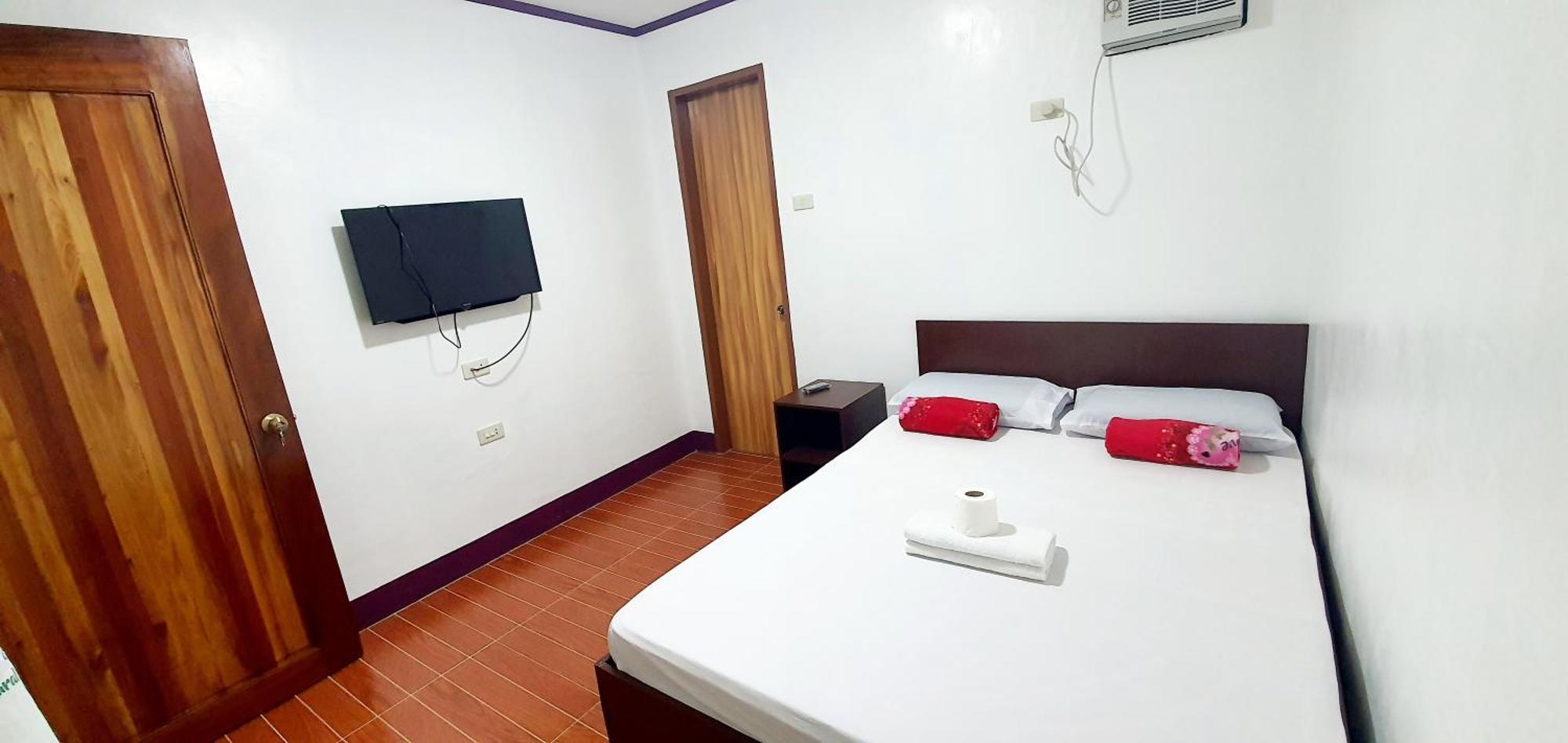 Sj Pabua Travellers Inn مامباجاو المظهر الخارجي الصورة